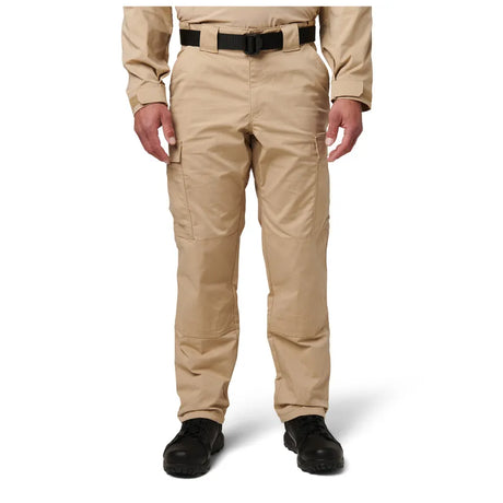 Elevate your tactical gear with the 5.11 TDU® Pant, constructed from Flex-Tac® stretch fabric for durability and flexibility. Reinforced knees, cargo pockets with TacTec™ compatibility, and removable blousing straps ensure functionality and comfort during missions. (320)