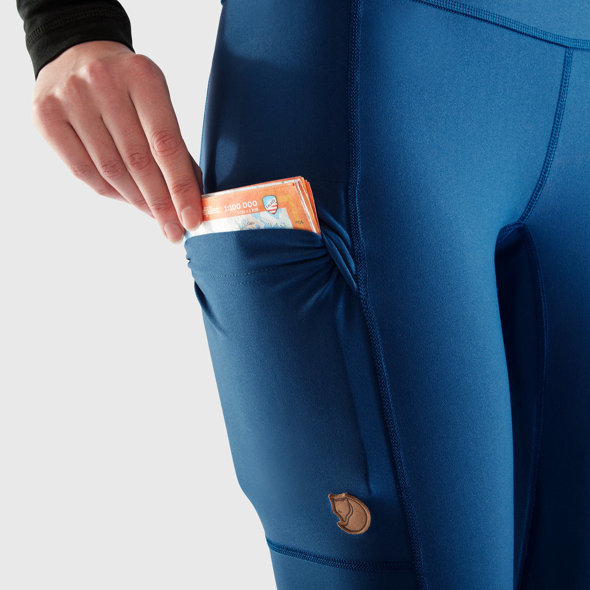 Zippered Security Pocket: Offers additional storage for valuables.