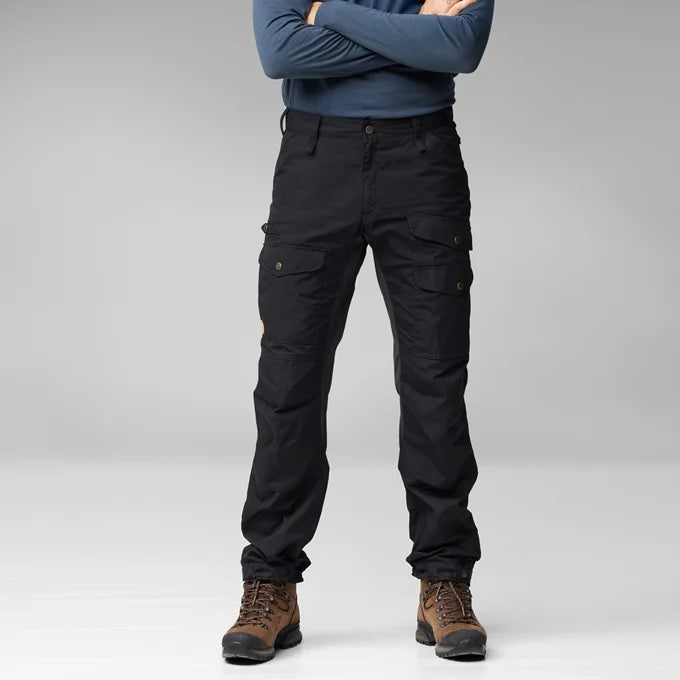 Buttoned strap adjustments at leg endings.