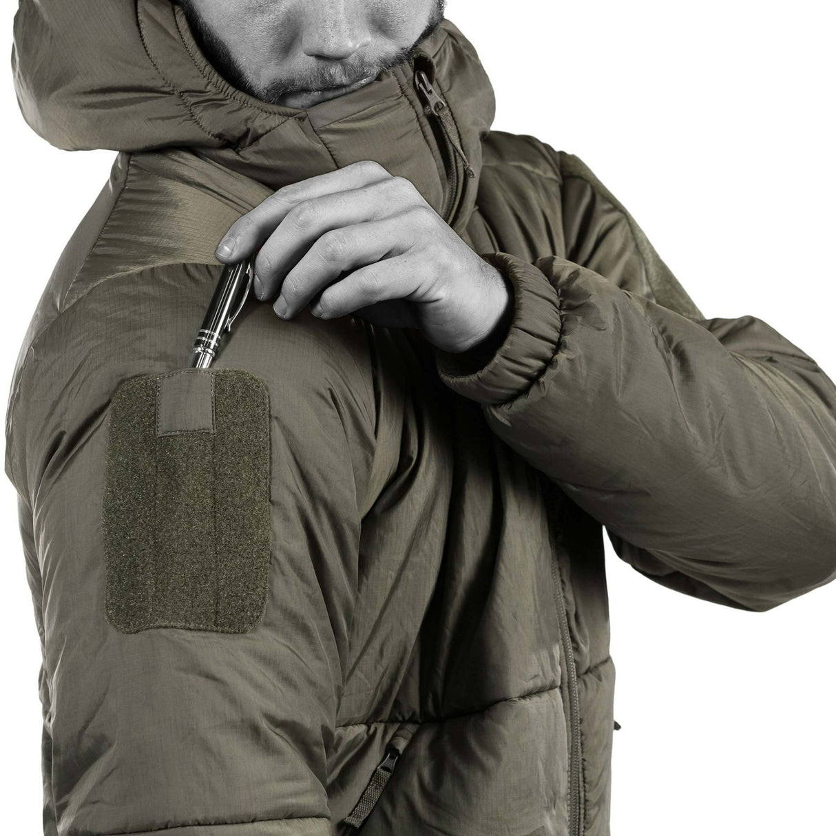UF PRO Delta ComPac Tactical Winter Jacket: Additional storage options with Velcro cover and upper-arm Velcro areas.